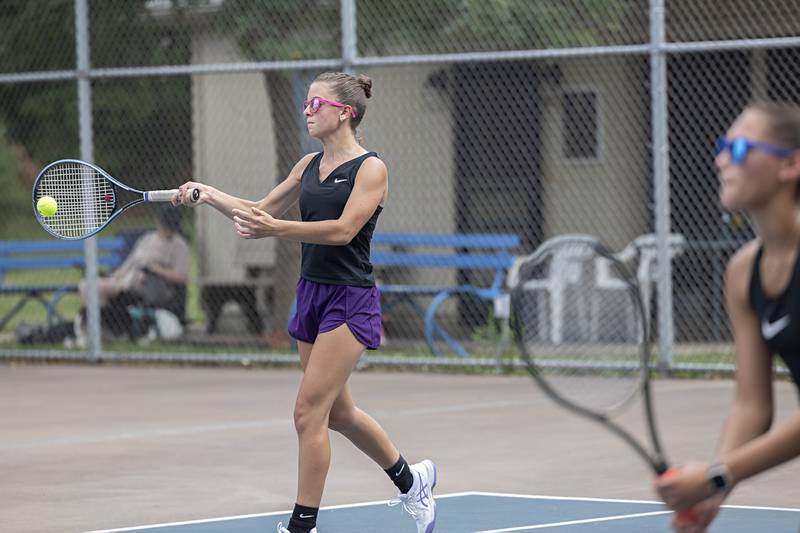 Leah Stees returns a shot during a doubles match Thursday, July 27, 2023 at the Emma Hubbs Tennis Classi