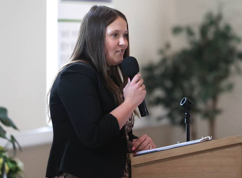 Ashlee Weaver, director of membership with the Sycamore Chamber of Commerce welcomes attendees Thursday, March 5, 2026, to the Sycamore Chamber of Commerce Annual Meeting in Memorial Hall at St. Mary's Catholic Church in Sycamore.