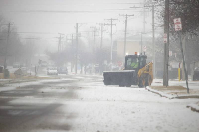 A small plow construction vehicle on Oneida Street in Joliet on Wednesday, Feb. 12, 2025.