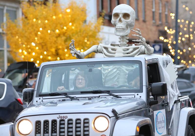 A giant skelton rides in the back of a Jeep sponsored by the Princeton Chamber of Commerce during the 5th annual Halloween Parade on Saturday, Oct. 28, 2023 downtown Princeton.