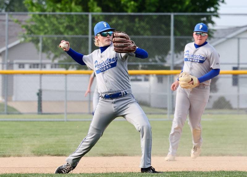 Princeton third baseman Nolan Kloepping throws across the diamond to get his man during Monday's 5-2 regional semifinal loss to Kewanee at Prather Field.