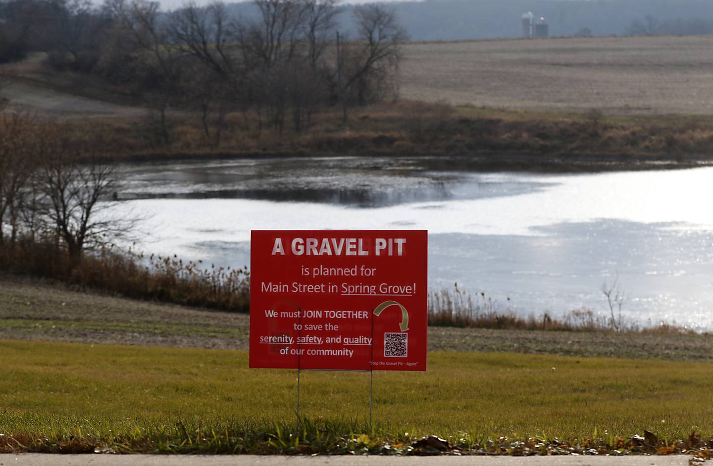A anti-gravel pit sign on Monday, Nov. 28, 2022, in Spring Grove, near a farm field purchased by Super Aggregates to develop into a gravel pit.