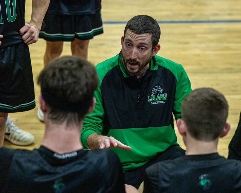 Leland's Head Coach Pat Torman talks to team during timeout in game against Newark in the quarterfinals of the Little Ten Conference Tournament on Monday, Feb. 2, 2026 at Somonauk High School in Somonauk.
