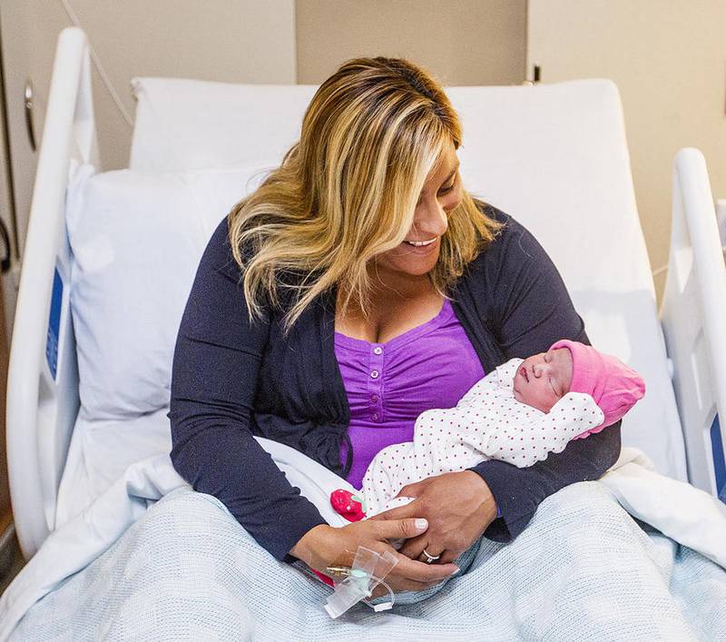 Heather Doty of Hampshire holds her daughter, Gianna, after giving birth to her earlier in the day at the newly opened Centegra Hospital-Huntley Tuesday, August 9, 2016. Centegra Hospital - Huntley was scheduled to open at 7 a.m. but in an unexpected turn, its doors opened about a half-hour early for Doty to give birth.