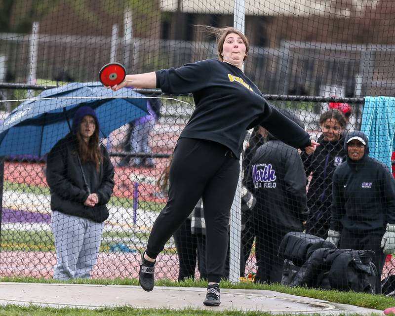 Downers Grove North's Grace Edwards competes in the discus throw during the West Suburban Silver conference meet at Downers Grove North.  May 6.2022.