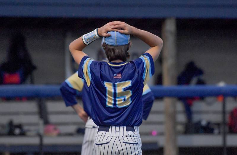 Marquette Academy's Alec Novotney (15) reacts to the 3-2 loss to Chicago Hope Academy in 12 innings during the 1A baseball sectional semifinal at Judson University in Elgin on Thursday, May 25, 2023.