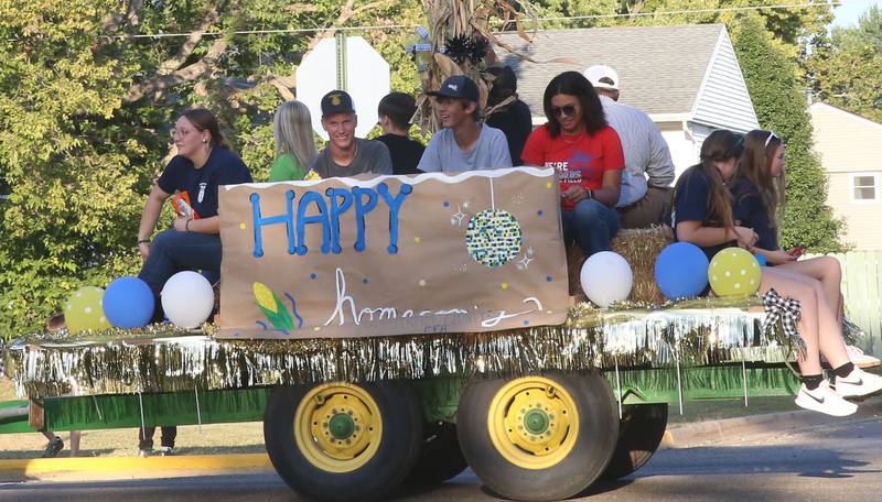 People ride in the inaugural Homecoming parade on Wednesday, Sept. 17, 2025 down Elm Street in Granville.