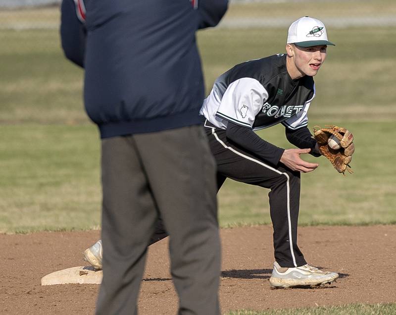 Rock Falls shortstop Ethan Mathews tags second base to complete a 1-4-6 triple play against Princeton Thursday, March 27, 2025.