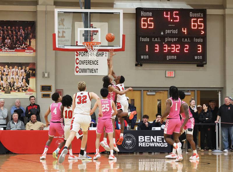 Yorkville’s Dayton Johnson (3) puts up the go-ahead layup against Whitney Young with 4.5 seconds left during the When Sides Collide Shootout on Saturday, Jan. 20, 2024 in Lisle, IL.