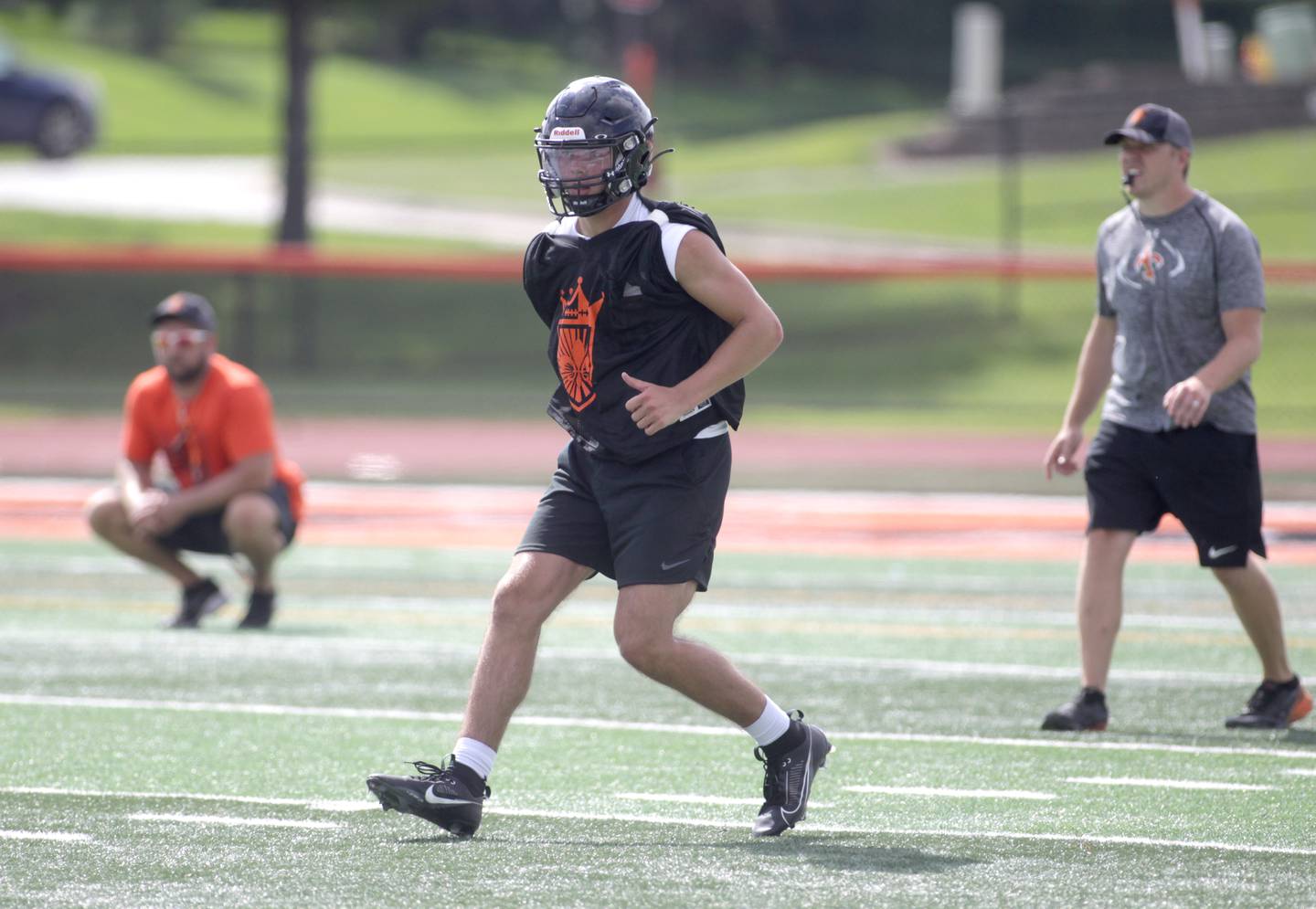 St. Charles East’s Charlie Bolsoni runs a route during the first day of practice for the fall season on Monday, Aug. 7, 2023 at the school.