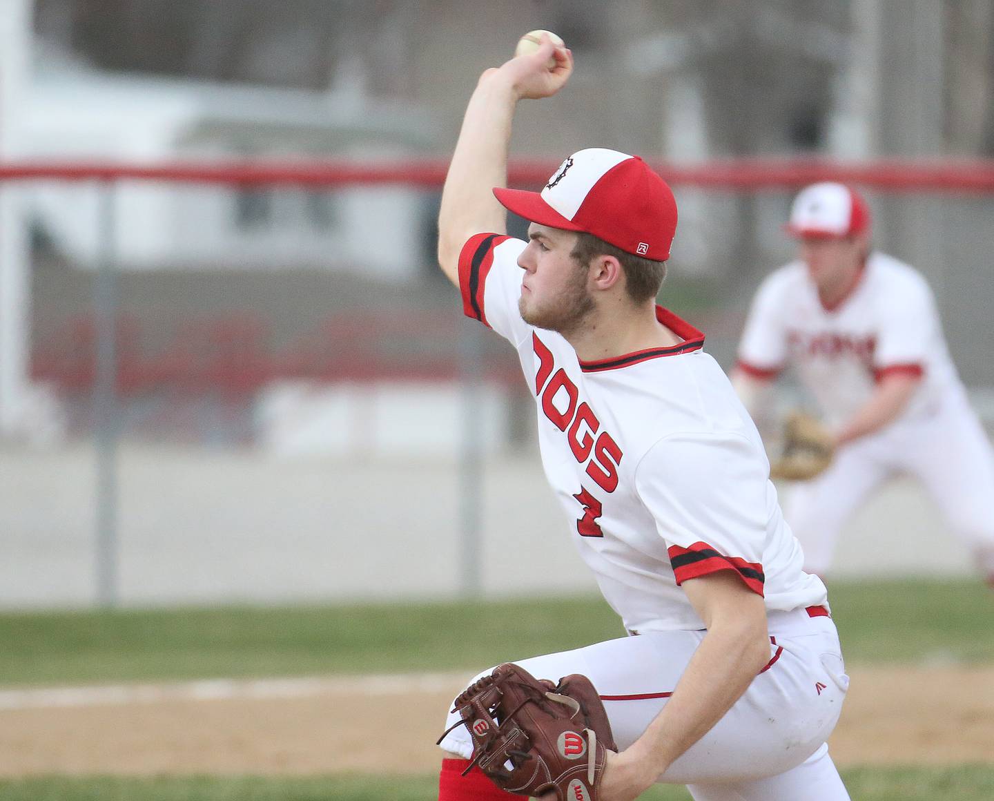 Streator's Landon Muntz (7) delivers a pitch to a Peotone batter during a game last season in Streator.