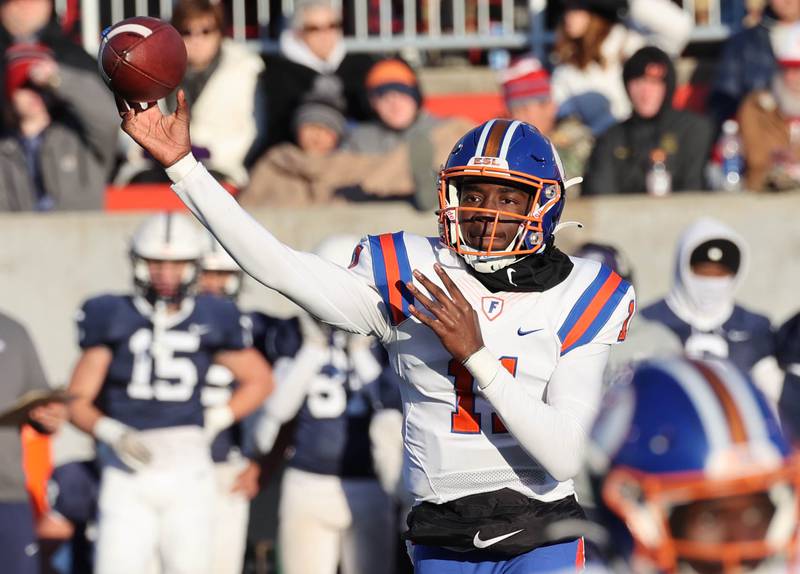 East St. Louis' Reece Shanklin throws a pass Saturday, Nov. 25, 2023, during their IHSA Class 6A state championship game against Cary-Grove in Hancock Stadium at Illinois State University in Normal.