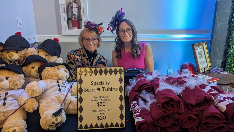Shorewood HUGS members Pam Kennedy of Channahon, and Carolyn Hall of Plainfield, sell Shorewood HUGS bears  at the Shorewood HUGS annual chocolate ball on Saturday, February 1, 2025, in Joliet.