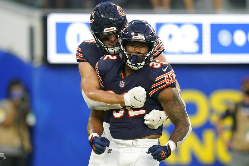 Chicago Bears running back David Montgomery, front, celebrates with teammate tight end Cole Kmet after scoring a touchdown during the first half against the Los Angeles Rams, Sunday, Sept. 12, 2021, in Inglewood, Calif.