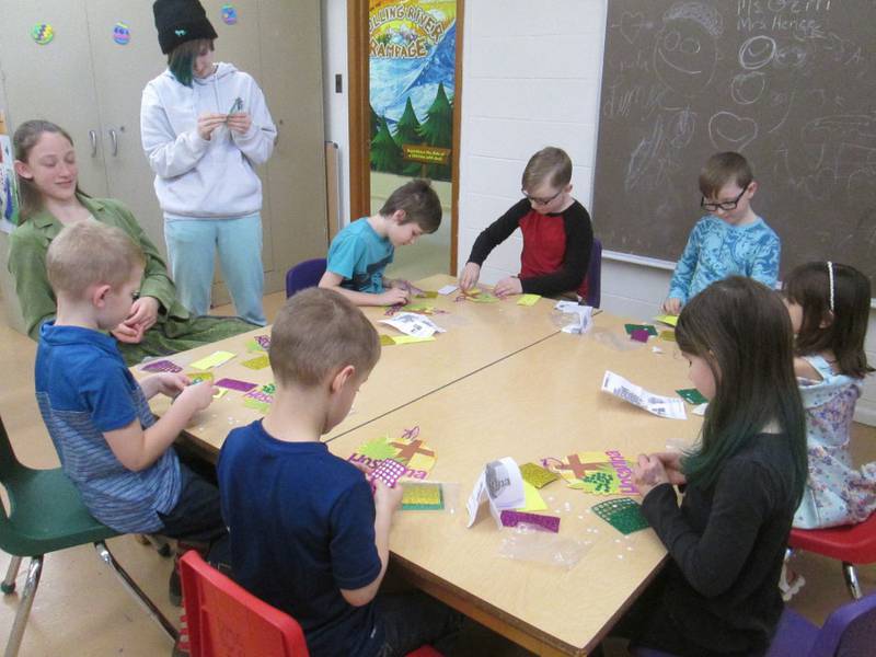 Sunday school students at the United Methodist Church of Plano make crafts for Palm Sunday and Easter.