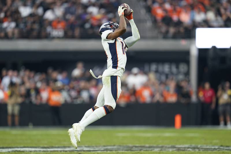 Denver Broncos wide receiver Courtland Sutton catches a pass during the second half of an NFL football game against the Las Vegas Raiders, Sunday, Oct. 2, 2022 in Las Vegas. (AP Photo/Abbie Parr)