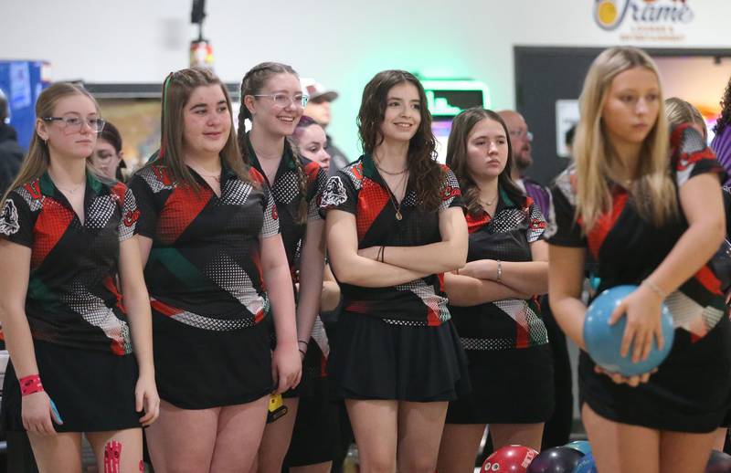 L-P's girls bowling team members watch teammate Kaitly Miller (right) bowl during the IHSA girls bowling Regional meet on Friday, Feb. 6, 2026 at the Illinois Valley Super Bowl in Peru.