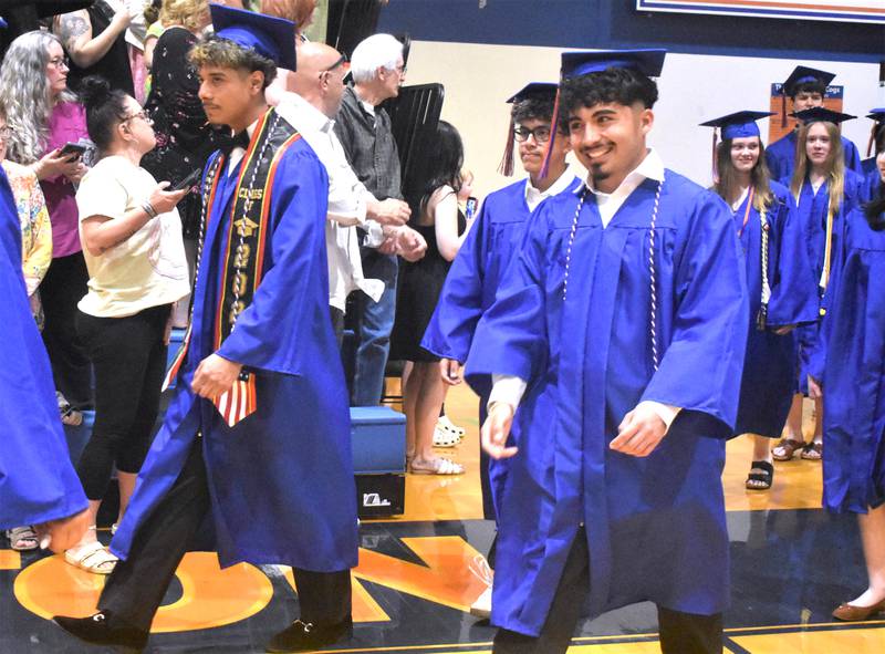 Genoa-Kingston graduates enter the gym Sunday, May 17, 2026, during the commencment ceremony at Genoa-Kingston High School.