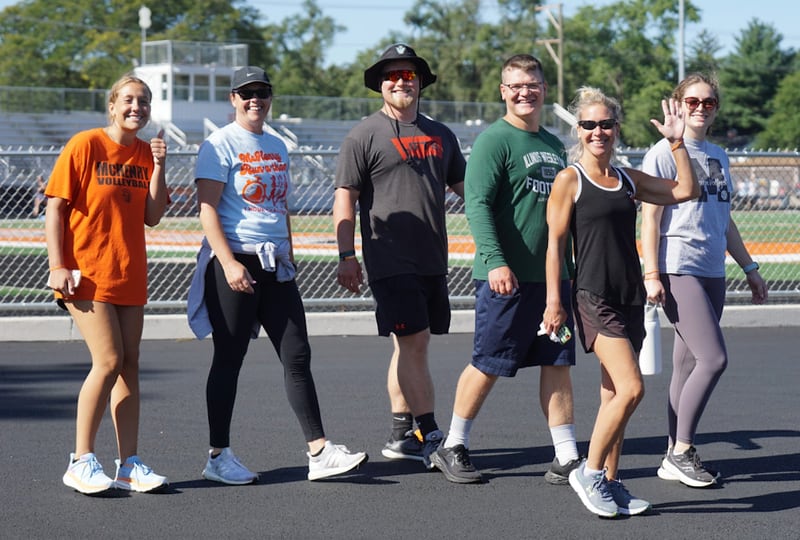 Walkers and runners participate in last year's McHenry Runathon one-hour challenge. This year's event will take place under the lights at McHenry's McCracken Field from 8 to 9 p.m. on Thursday, Aug. 7.