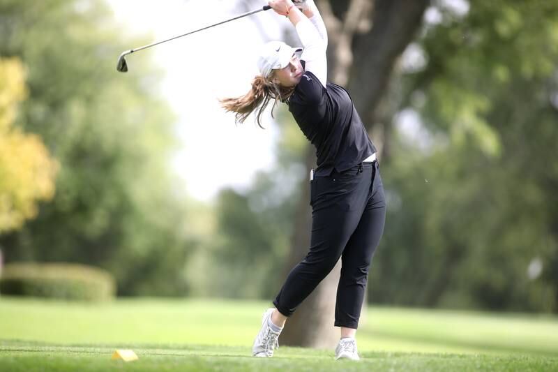 Glenbard North’s Nicole McGuire tees off during the Class 2A Glenbard North Regional girls golf meet at Bloomingdale Golf Club on Thursday, Sept. 28, 2023.