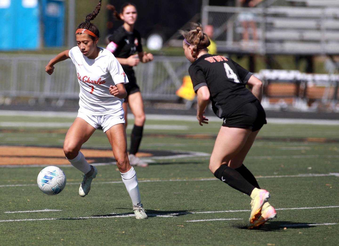 St. Charles East's Mya Leon gets control of the ball during a game against Wheaton Warrenville South on Friday, May 16, 2025 in Wheaton.