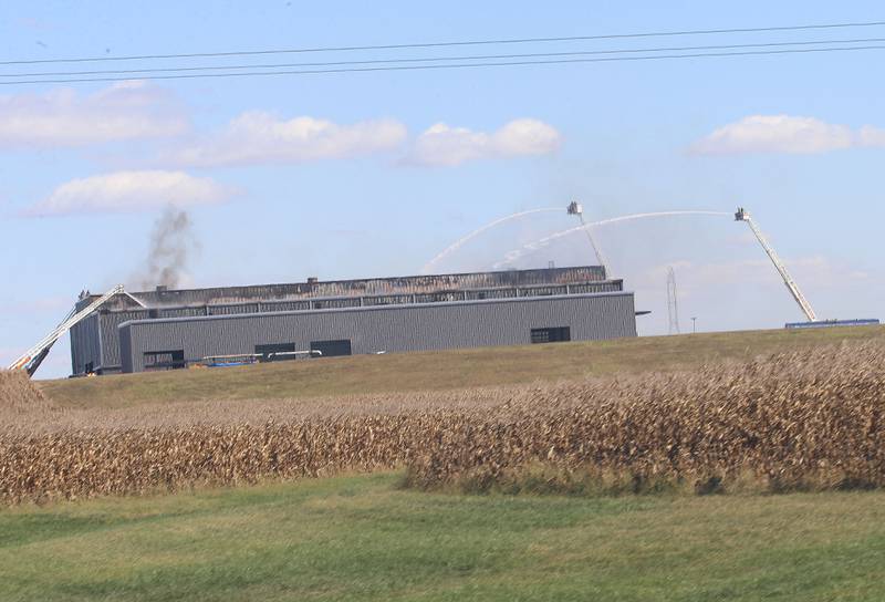 Firefighters work the scene of a structure fire on Wednesday, Oct. 8, 2025 at Marquis Energy in Hennepin. The fire was upgraded to a 5th alarm dispatching the (MABAS) Mutual Aid Box Alarm System. The fire broke out around 11a.m.