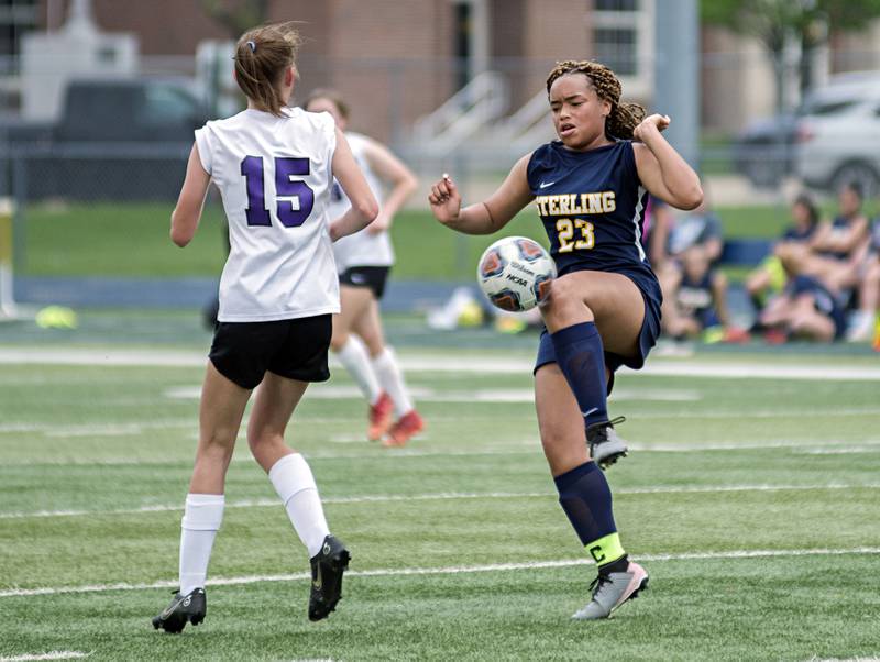 Sterling's Chelsey Chatters handles a ball against Dixon on Tuesday, May 10, 2022.