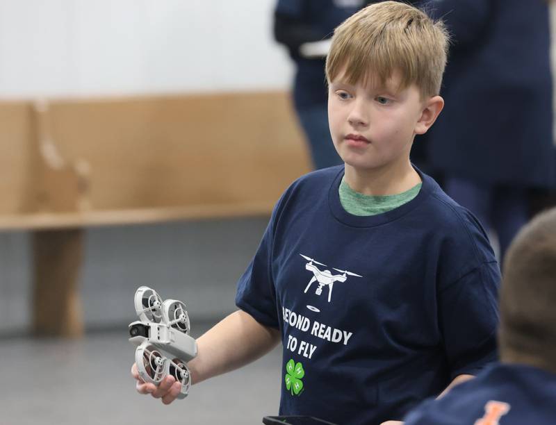 Agustus Zelinski of La Salle, carries his drone during a drone competition on Saturday, Nov. 22, 2025 at the Second Story Teen Center in Princeton. Teams from Bureau, La Salle and Marshall-Putnam counties came together to showcase their flying skills during a drone competition on Saturday, Nov. 22, 2025 at the Second Story Teen Center in Princeton. Second Story Teen Center partnered with the University of Illinois Extension of Bureau, La Salle Marshall and Putnam Counties. Drones and awards were purchased through a grant and donations from Compeer Financial.