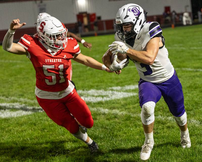 Jake Zepezauer (3) of Dixon runs ball as Kameron Magana (51) of Streator follows on Friday, October 17, 2025 at Streator High School in Streator.