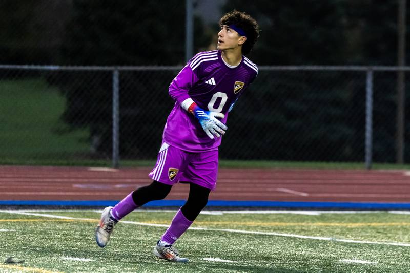 Andrew's Carson Solomon keeps his eyes on the ball during the 3A L-W East Regional boys varsity soccer match against Joliet West at Lincoln-Way East on Oct. 21, 2025.