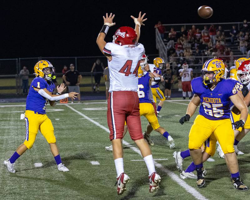 Mendota's Javier Hernandez throws a pass to a teammate downfield during the game at The Jeff Prusator Athletic Complex on September 12, 2025 at Mendota High School.