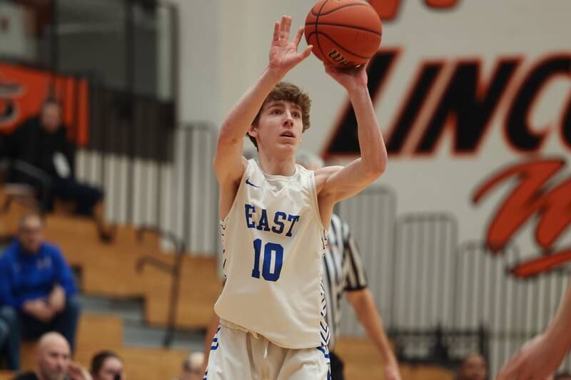 Lincoln-Way East’s Matt Hudik puts up the three point shot against Hinsdale Central in the Lincoln-Way West Warrior Showdown on Saturday January 28th, 2023.