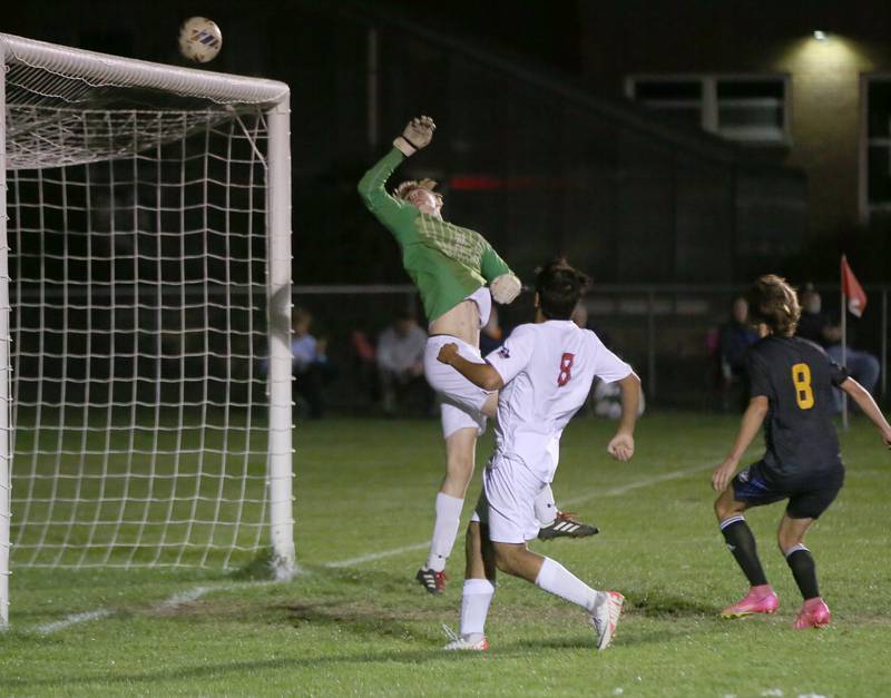 Earlville keeper Adam Waite watches the ball sail over his head while playing Somonauk in the Little Ten Conference championship game on Thursday, Oct. 5,  2023 at Hinckley High School.