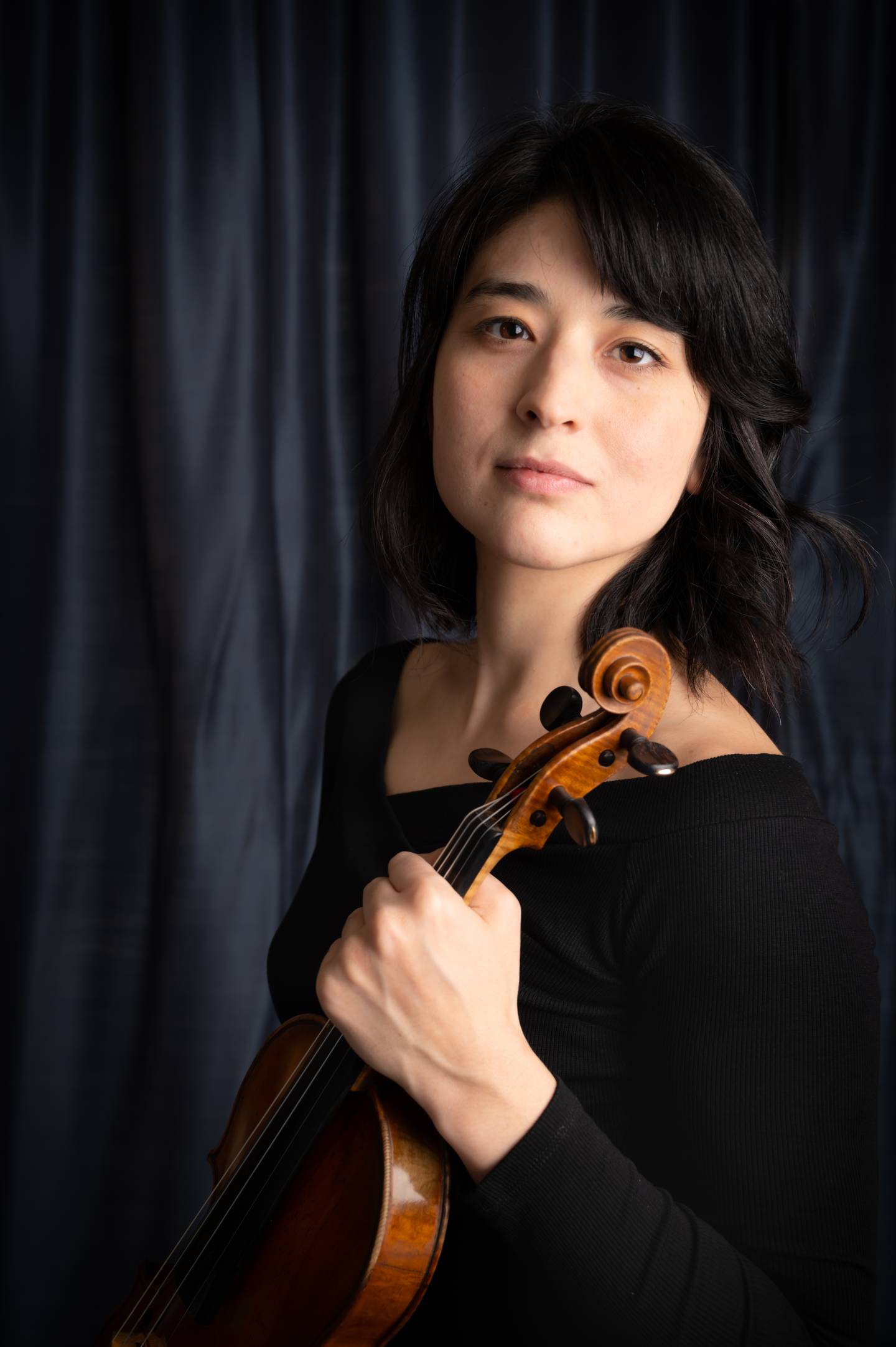 Concertmaster and violinist Naha Greenholtz