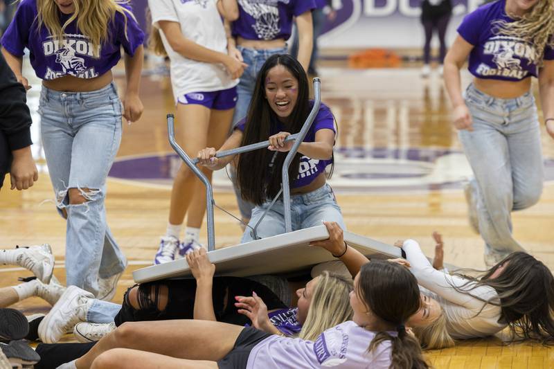 The junior class works their way across the gym in a game of table surf  Friday, Sept. 27, 2024, at Dixon High School.