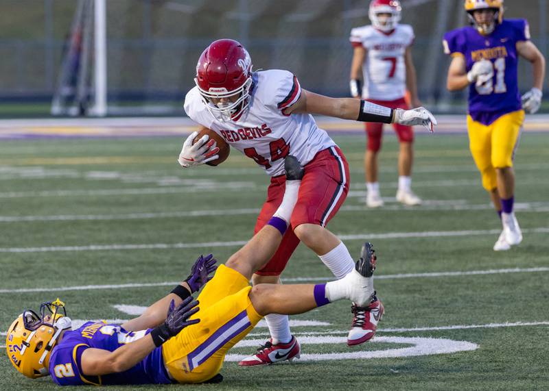 Mendota's Keegan Beetz attempts to stop a run by Hall's Chace Sterling at The Jeff Prusator Athletic Complex on September 12, 2025 at Mendota High School.