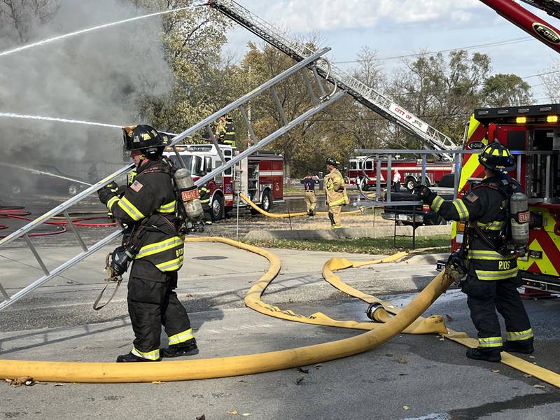 Joliet firefighters battle a fire in the Greenway Plaza, 1301 N. Broadway St., Joliet on Wednesday afternoon Oct. 30, 2024.