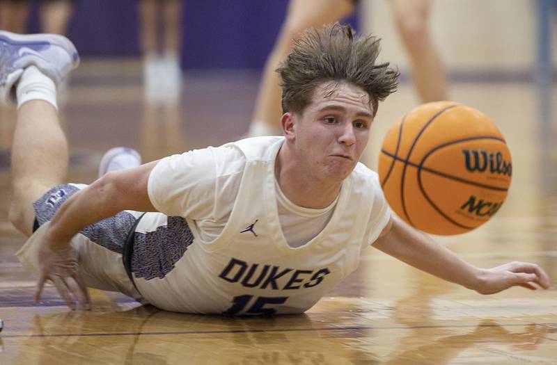 Dixon’s Jimi Gosinski dives for a loose ball against Stillman Valley Friday, Jan. 9, 2026.