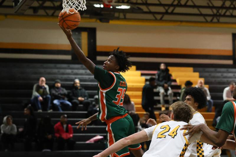 Plainfield East’s Alijah Little lays in a shot against Joliet West on Friday, Dec. 19, 2025 in Joliet.