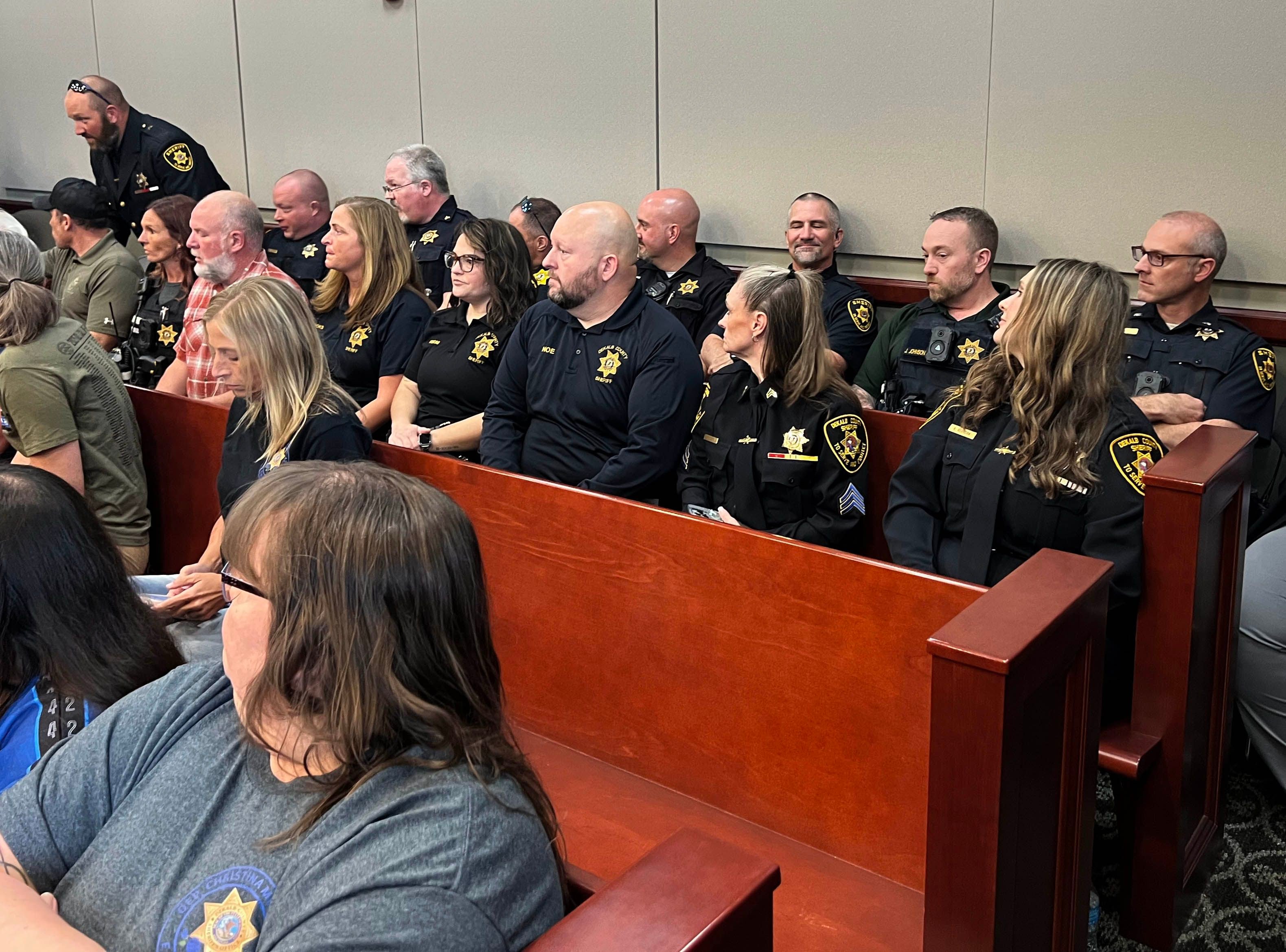 Dozens of law enforcment members along with family and friends of Christina Musil pack the courtroom Tuesday, Aug. 26, 2025, during the sentencing hearing for Nathan P. Sweeney, who pleaded guilty to driving under the influence and causing the 2024 crash that killed Musil. Sweeney was sentenced to the maximum of 14 years.