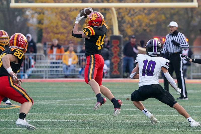 Batavia’s Jake Feller (44) intercepts a pass against Downers Grove North during a class 7A quarterfinal playoff football game at Batavia High School on Saturday, Nov. 16, 2024.