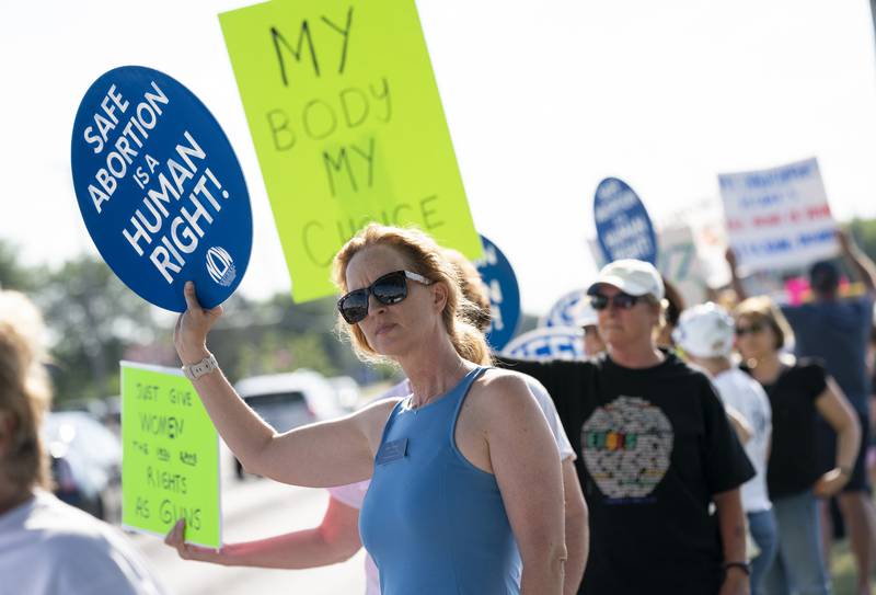 Mary Morgan, of Island Lake, who is running for state representative for District 52, participates during a protest Friday, June 24, 2022, over the overturning of Roe v. Wade, organized by the McHenry County National Organization for Women. On Friday, the U.S. Supreme Court overturned the decades-old ruling that upheld the right to an abortion.