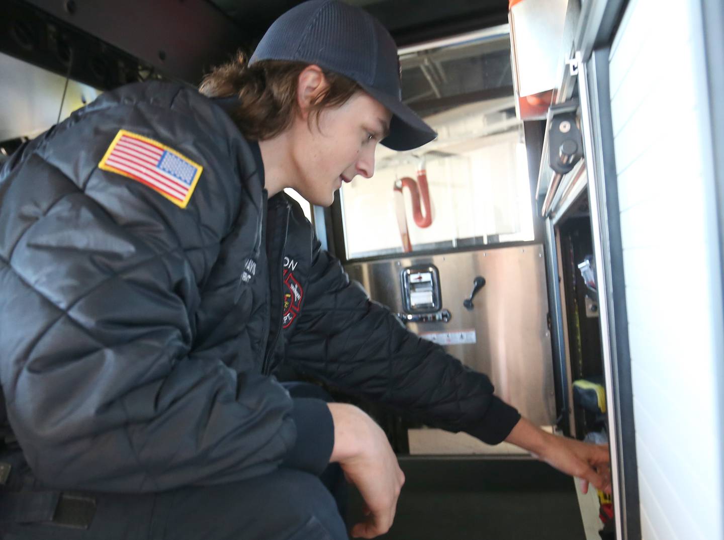 Princeton firefighter Cael Davis takes inventory on a fire engine on Saturday, April 13, 2024 at the Princeton Fire Department.