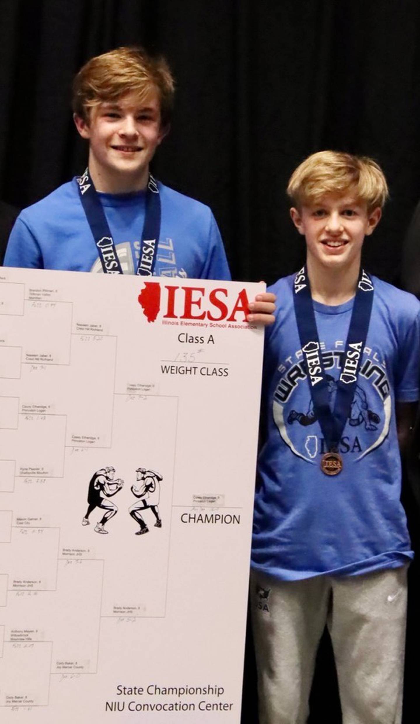 Best friends Casey Etheridge (left) and Augustus Swanson brought home a first-place and third-place medals, respectively, over the weekend in the IESA State Wrestling Tournament in DeKalb.