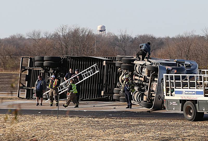 La Salle firefighters and EMS work the scene of a semi rollover on the west on ramp to Interstate 39 on Friday, Dec. 2, 2022 near La Salle. La Salle and Utica fire and EMS were dispatched to the scene. The incident happened shortly before 9:30a.m.