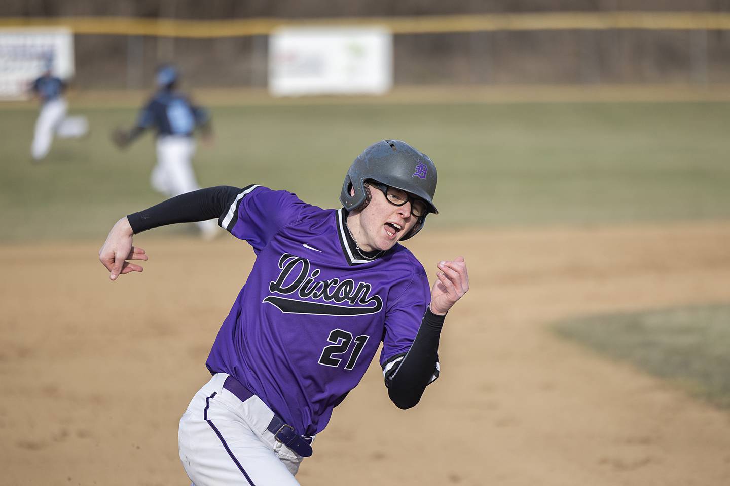 Dixon’s James Leslie rounds third on his way to score Monday, March 20, 2023 against Rockford Guilford.