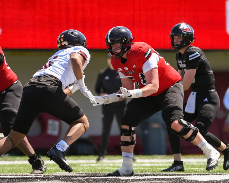 Northern Illinois University's offensive line Evan Malcore, right, tries to defend Jay’shon Thomas during practice on Saturday April 26, 2025, held at Huskie Stadium in DeKalb.