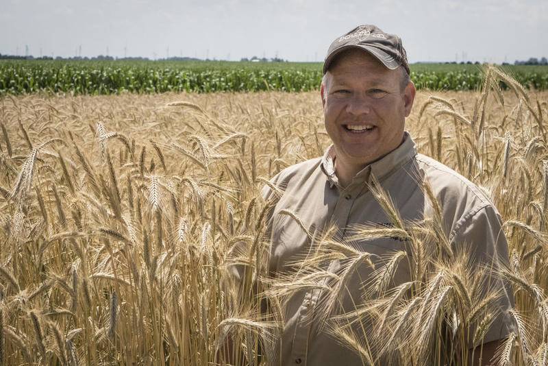 Co-founder Jamie Walter poses for a portrait in a field of rye on Thursday July 6, 2017.