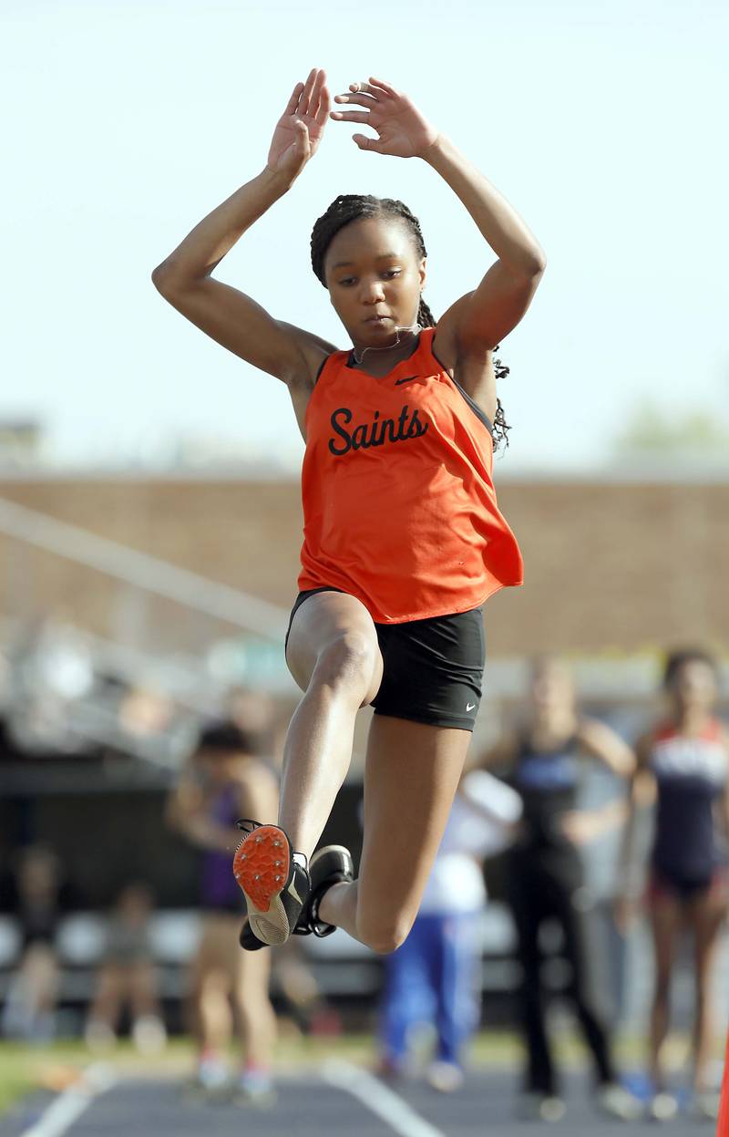 Kendal Saunders, of St. Charles East competes in the long jump during the Kane County girls track and field meet Thursday April 27, 2023 in Aurora.