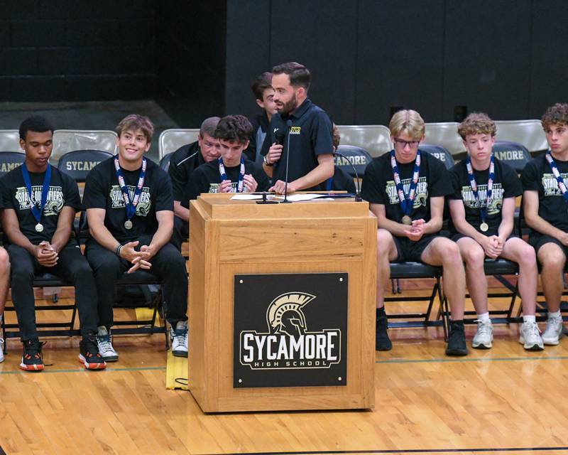 Sycamore boys track coach Mitch Doty talks during the pep rally on Tuesday June 4, 2025, at Sycamore High School after the team brought back the championship trophy.